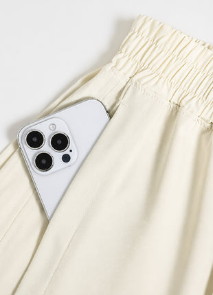 Dual side pocket design of ivory high rise split running shorts