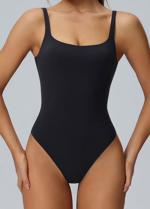 black sculpting yoga bodysuit
