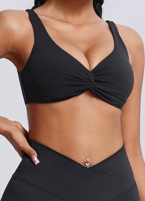 black twist front high impact yoga bra
