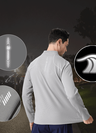 half zip long sleeve sports top with reflective logo